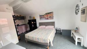 Кровать или кровати в номере Casa Portofino