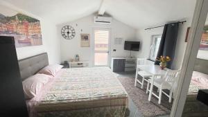 Кровать или кровати в номере Casa Portofino
