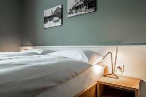 Postel nebo postele na pokoji v ubytování Landgasthof Adler