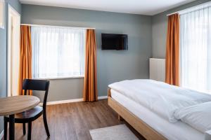 Postel nebo postele na pokoji v ubytování Landgasthof Adler