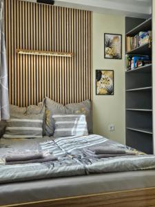 Posteľ alebo postele v izbe v ubytovaní Bowery Guest Houses - Árnyas vendégházak