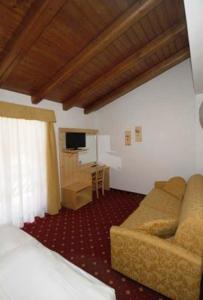 TV a/nebo společenská místnost v ubytování Hotel Fantelli