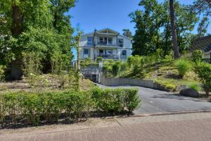 Сад в Ferienwohnung Strandkorbliebe in der Villa Düne Binz