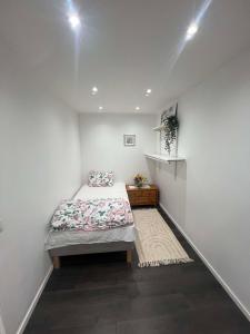 Ένα ή περισσότερα κρεβάτια σε δωμάτιο στο 3 and half room apartment
