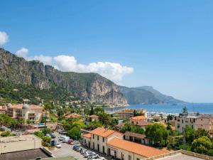 a view of the town of positano on the amalfi coast at ibis Styles Beaulieu sur Mer in Beaulieu-sur-Mer