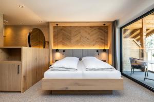 Voodi või voodid majutusasutuse Hotel Forellenhof toas