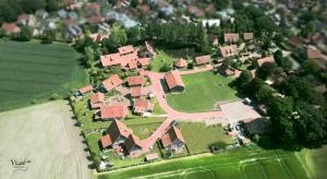 arial view of a large estate with a group of houses at Ferienwohnung Bussjans Hof in Dinklage