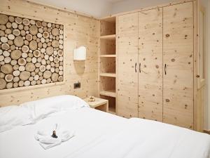 Ένα ή περισσότερα κρεβάτια σε δωμάτιο στο B&B Augusto