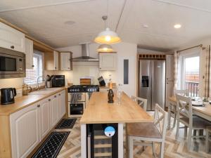 Kuchyň nebo kuchyňský kout v ubytování Kingfisher Lodge 36