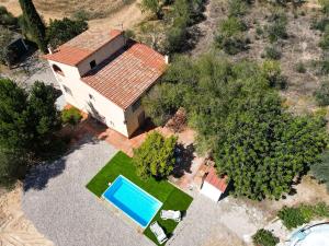 an aerial view of a house with a swimming pool at La Noguera by Unik Vacation in Valls
