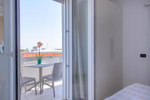 Postel nebo postele na pokoji v ubytování Hotel Sans Souci + 37 fotografií