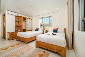Ocean Bliss Hotel - Free Sauna客房内的一张或多张床位