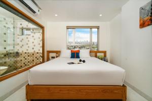 Ocean Bliss Hotel - Free Sauna客房内的一张或多张床位
