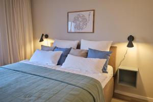 Postel nebo postele na pokoji v ubytování Stadtversteck - Zentral - 5min zur Bali Therme und GOP - Boxspringbett + 21 fotografií