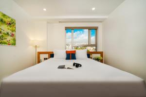 Ocean Bliss Hotel - Free Sauna客房内的一张或多张床位