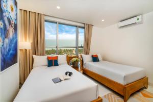 Ocean Bliss Hotel - Free Sauna客房内的一张或多张床位
