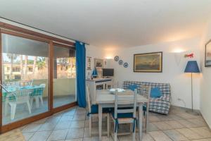 TV/trung tâm giải trí tại Appartamento Palau Village 9C +9 ảnh