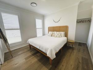 Postel nebo postele na pokoji v ubytování The Mermaid's Retreat - Pool in Kiama! + 23 fotografií