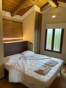 Letto o letti in una camera di Poderi S Luca