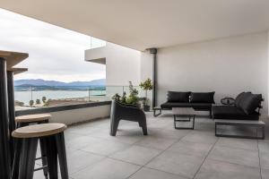 Khu vực ghế ngồi tại Le Calypso B01 - Climatisé avec vue mer