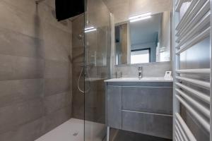 Phòng tắm tại Le Calypso B01 - Climatisé avec vue mer