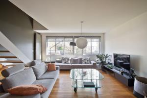 Posezení v ubytování Maison Trégain - Grand Jardin et Terrasse