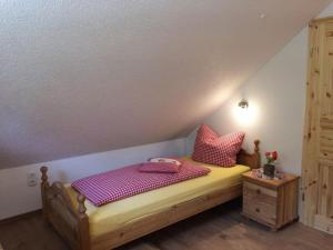 Ένα ή περισσότερα κρεβάτια σε δωμάτιο στο Ferienhaus