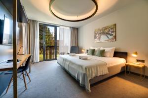 Posteľ alebo postele v izbe v ubytovaní Lyra Hotel Plitvice