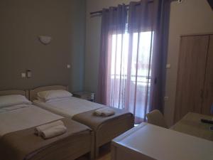 Кровать или кровати в номере Hotel Isidora +35 фотографий