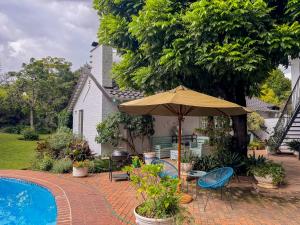 Garður fyrir utan Amoris Guesthouse Randburg II - Darrenwood