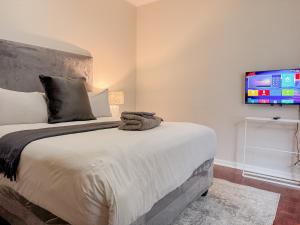 Amoris Guesthouse Randburg II - Darrenwood客房内的一张或多张床位
