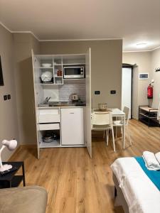 Kuchyň nebo kuchyňský kout v ubytování San Lorenzo Apartment + 48 fotografií