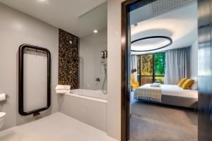 Posteľ alebo postele v izbe v ubytovaní Lyra Hotel Plitvice