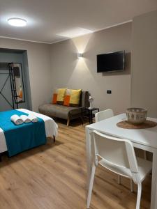 TV a/nebo společenská místnost v ubytování San Lorenzo Apartment