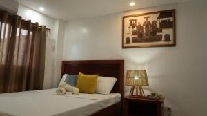 Postel nebo postele na pokoji v ubytování Villa Laetisha Beach Resort