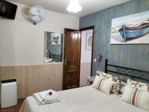 A bed or beds in a room at V.V Casa Mones