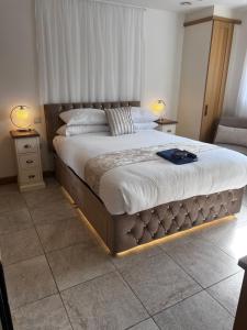 Postel nebo postele na pokoji v ubytování Falconwood + 8 fotografií