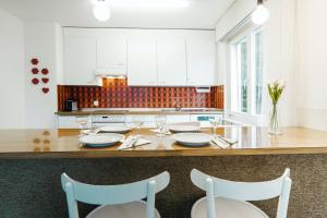 Kuchyň nebo kuchyňský kout v ubytování Apartment Morgensonne