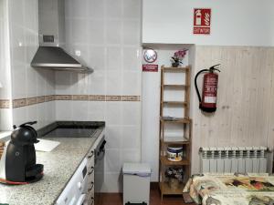 A kitchen or kitchenette at V.V Casa Mones