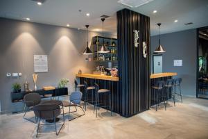 Reštaurácia alebo iné gastronomické zariadenie v ubytovaní Lyra Hotel Plitvice
