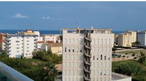 a view of a city with tall buildings at Precioso apartamento para disfrutar en familia in Piles +11 photos