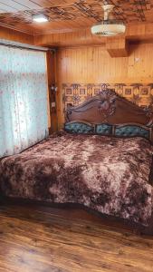 Postel nebo postele na pokoji v ubytování RocRidge Home stay