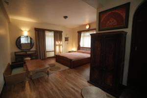 Ένα ή περισσότερα κρεβάτια σε δωμάτιο στο Heritage Suite with Terrace