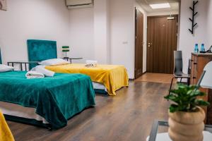 Postel nebo postele na pokoji v ubytování Hotel Świt
