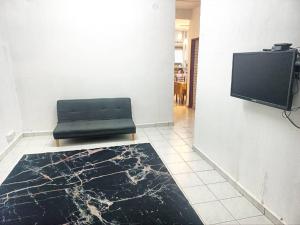 TV a/nebo společenská místnost v ubytování AYUHOMESTAY iii KUNDANG, GAMUDA GARDEN