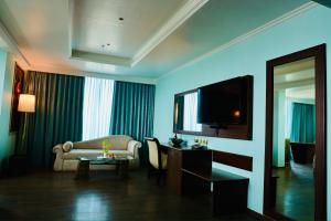TV/Unterhaltungsangebot in der Unterkunft The Quilon Beach Hotel and Convention Center