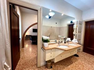 Koupelna v ubytování Locazione Turistica Joyful Padova