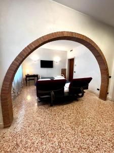 TV a/nebo společenská místnost v ubytování Locazione Turistica Joyful Padova
