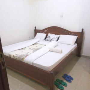 Ένα ή περισσότερα κρεβάτια σε δωμάτιο στο Angelina guest house