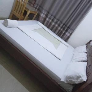 Ένα ή περισσότερα κρεβάτια σε δωμάτιο στο Angelina guest house